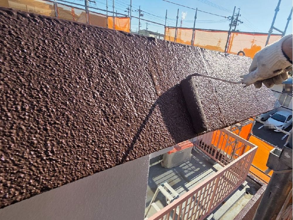 I様(四日市)ハチマキ(上塗り) 奈良市の外壁塗装、防水工事をリペイント匠が施工した写真