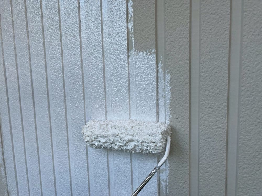 外壁(下塗り2) 生駒市で外壁屋根塗装と防水工事をリペイント匠が施工した写真
