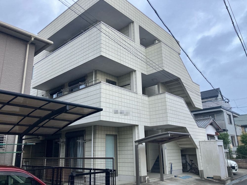 生駒市_S様_施工前_全体 生駒市の外壁塗装、屋根塗装、防水工事をリペイント匠が施工した写真