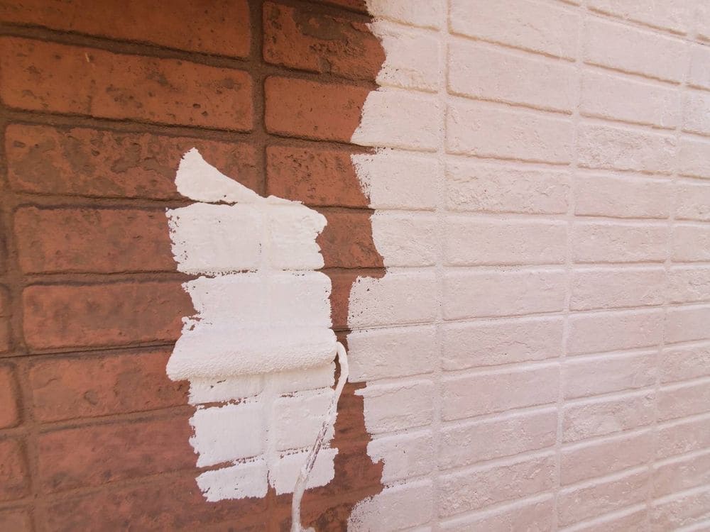 外壁(下塗り2) 生駒市で外壁・屋根塗装と防水工事をリペイント匠が施工した写真