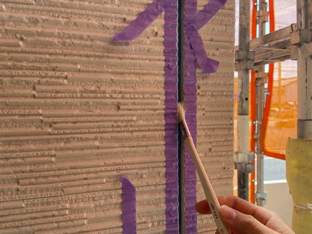 生駒市_K様_シール(プライマー塗布) 生駒市の外壁塗装、防水工事をリペイント匠が施工した写真