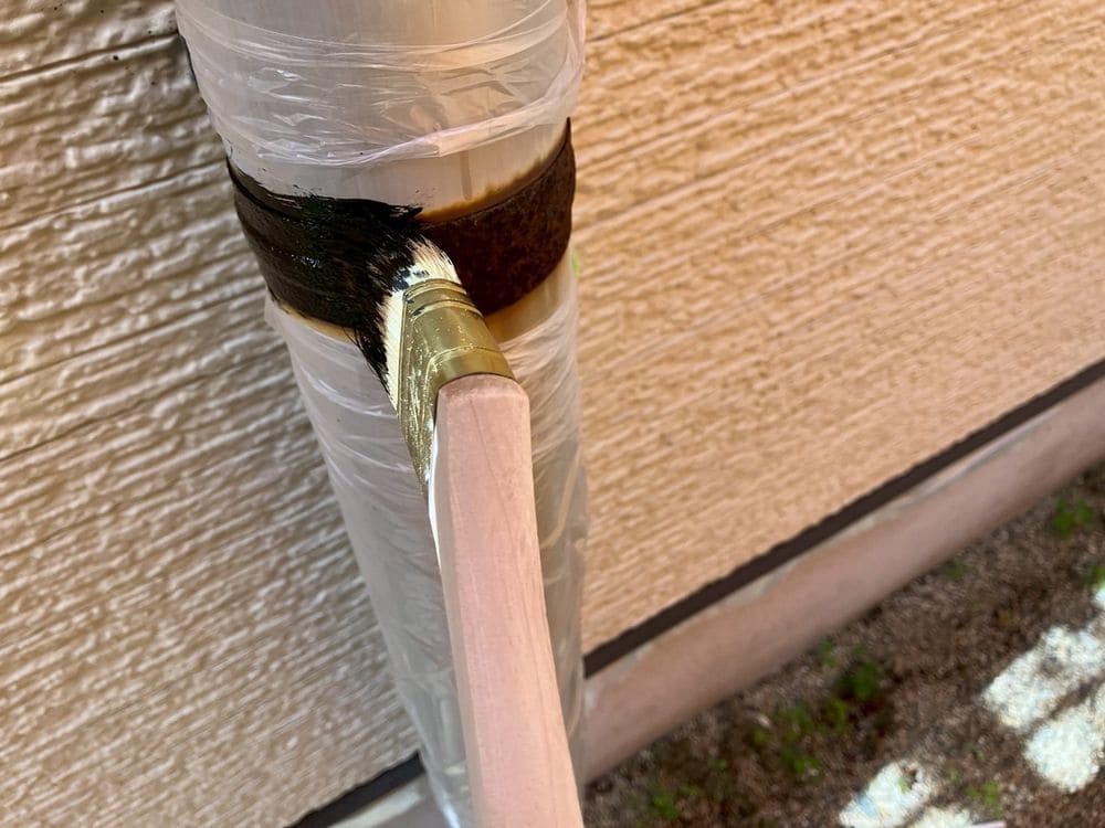 T様(津)下塗り竪樋 津市の外壁塗装、防水工事をリペイント匠が施工した写真
