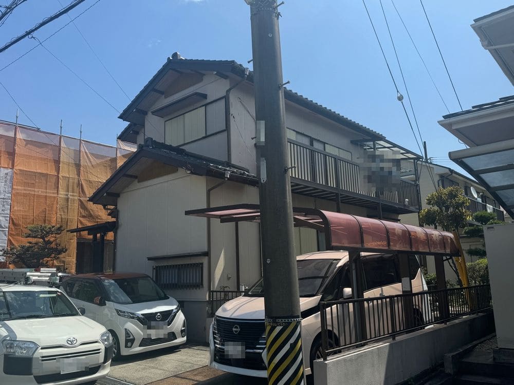 施工前_外壁全体 員弁郡の外壁塗装をリペイント匠が施工した写真