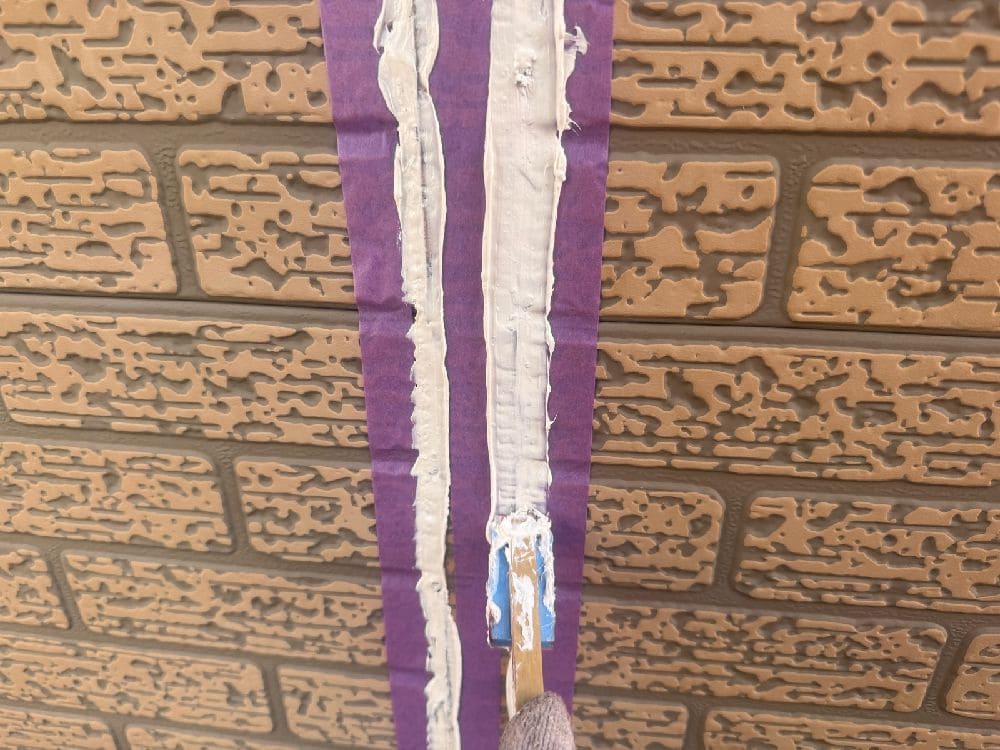 K様(四日市)シール(打ちならし) 菰野町の外壁塗装、防水工事をリペイント匠が施工した写真