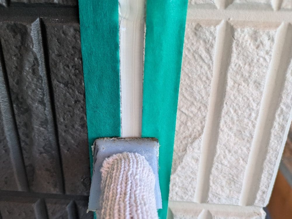 S様(名張市希央台)_シール(打ちならし) 名張市の外壁塗装をリペイント匠が施工した写真