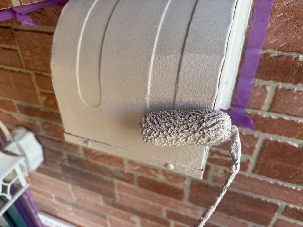 三重郡菰野町_I様_換気フード(中塗り) 三重郡菰野町の外壁塗装をリペイント匠が施工した写真