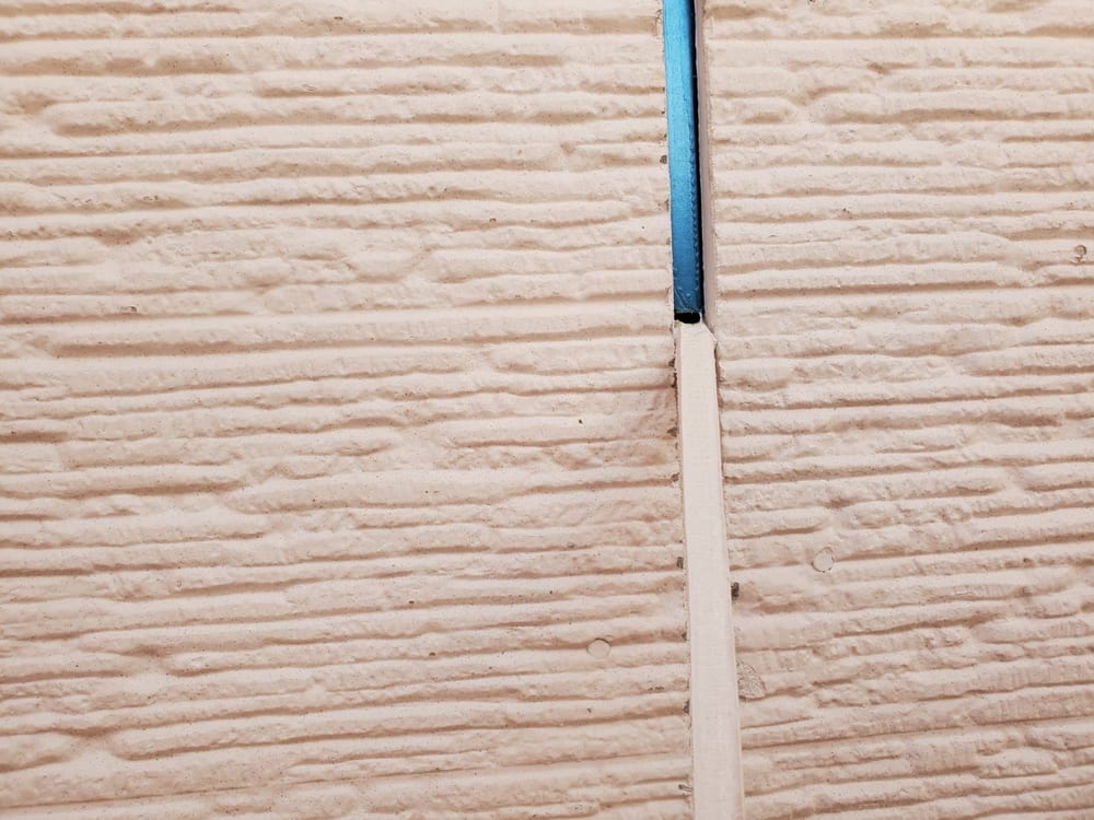 M様(亀山)シール(撤去) 亀山市の外壁塗装、防水工事をリペイント匠が施工した写真