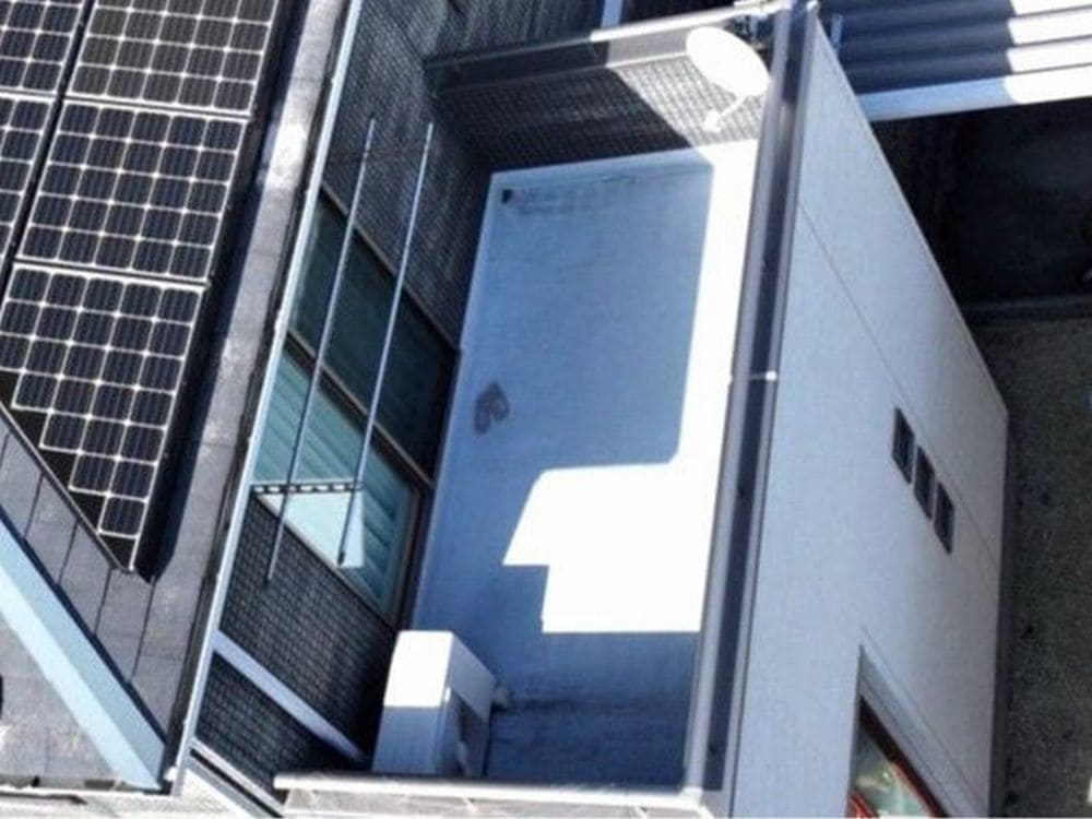 亀山市の外壁塗装、屋根塗装、防水工事をリペイント匠が施工した写真